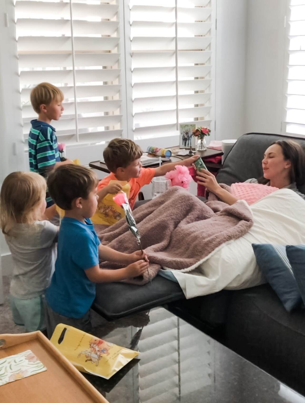 Jenn’s kids visiting her after surgery.