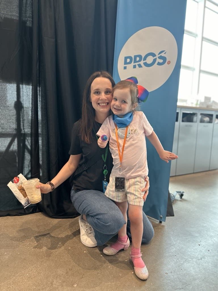 Kaylee Gallagher with her child at PROS office, image
