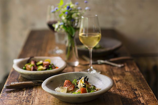 Two salads and two glasses of wine