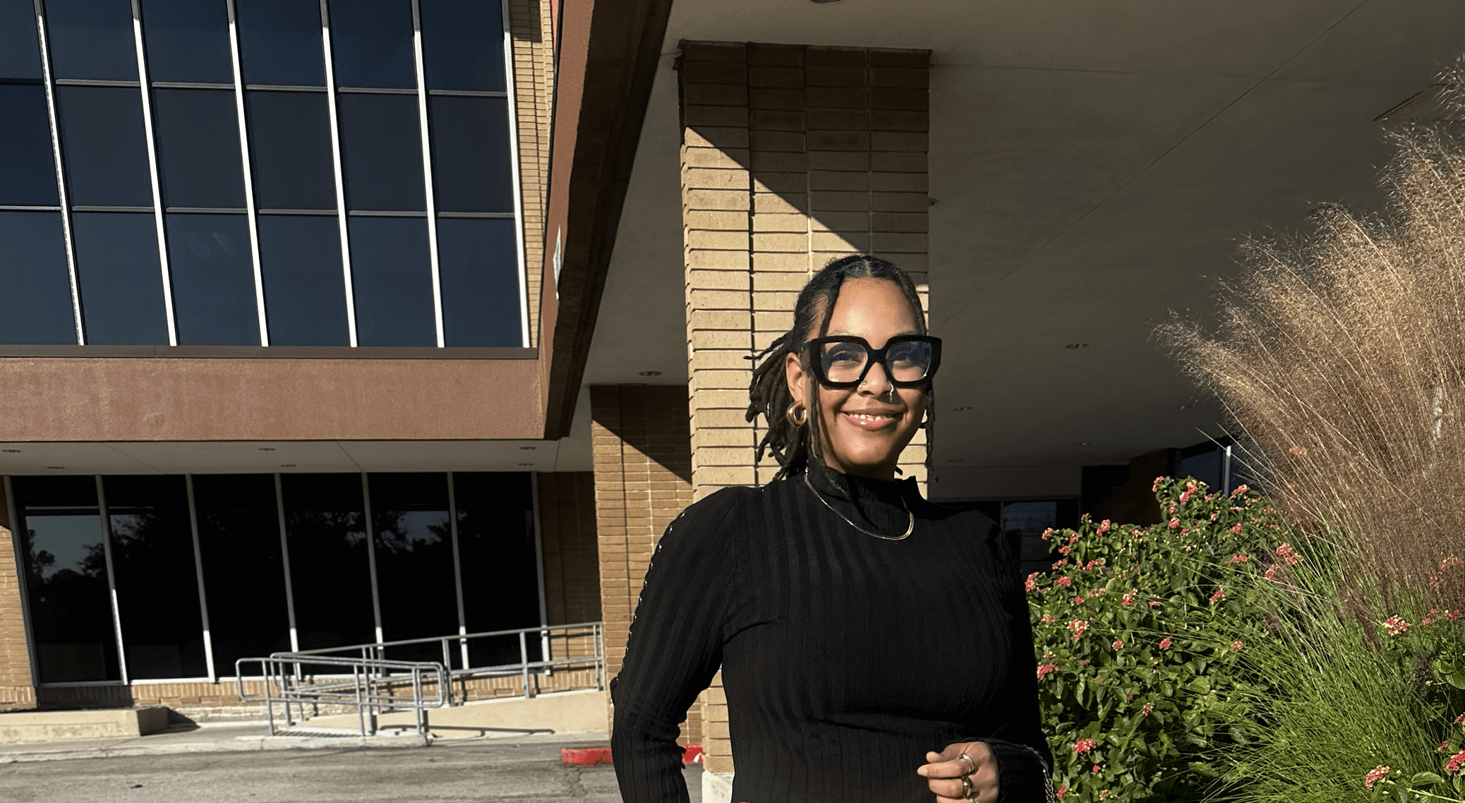 woman in front of building
